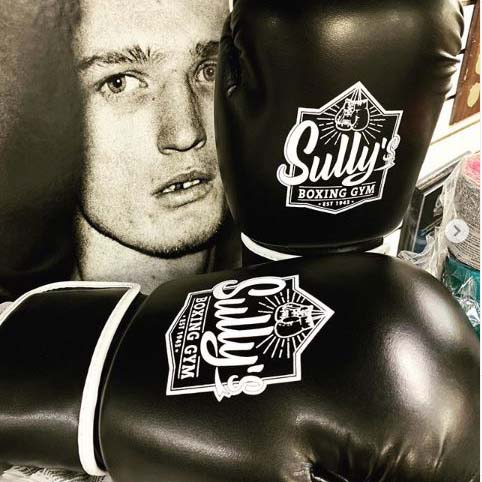 sully's logo on black boxing gloves