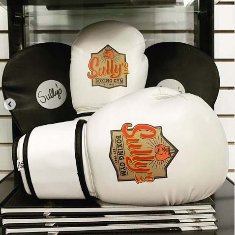 sully logo on white boxing gloves